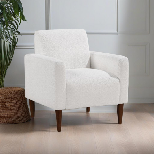Cozy white boucle armchair with dark wood legs perfect for living rooms