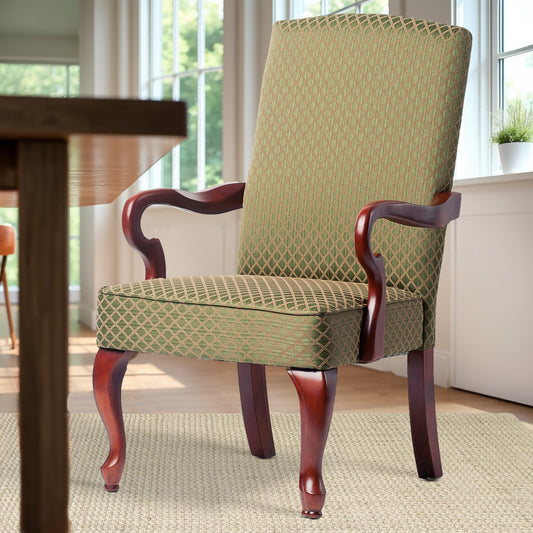 Elegant upholstered dining chair in green diamond pattern fabric with dark wood frame and cabriole legs