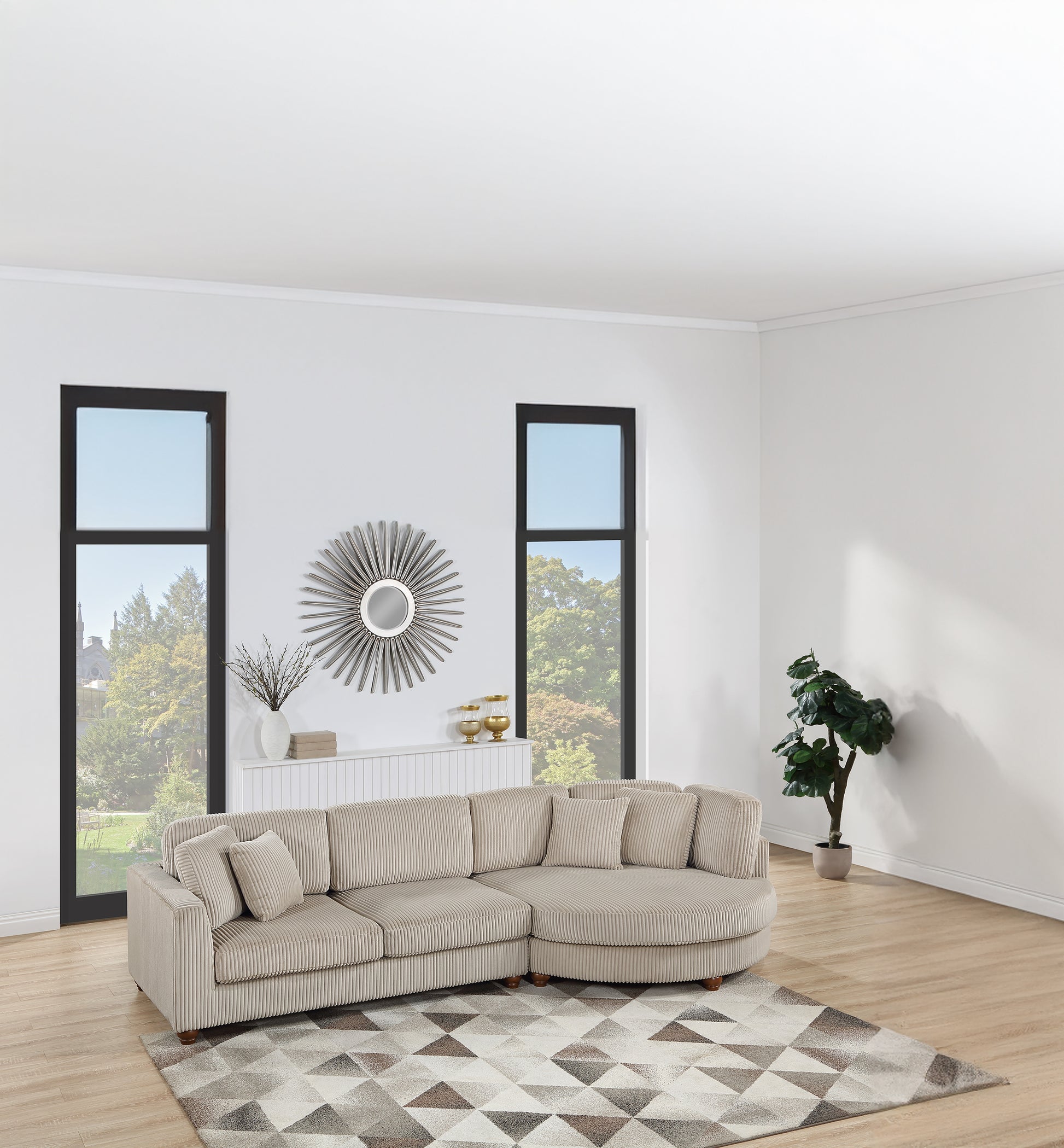 Sectional sofa in light beige corduroy with curved arm and accent pillows