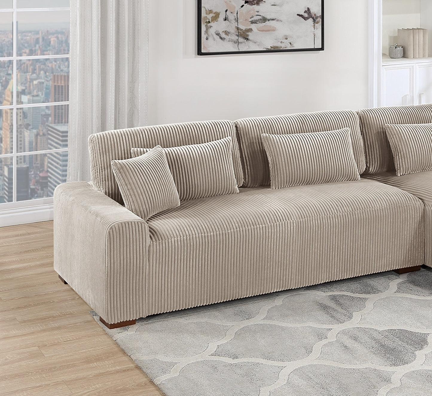 Beige corduroy sectional sofa with plush pillows modern living room style