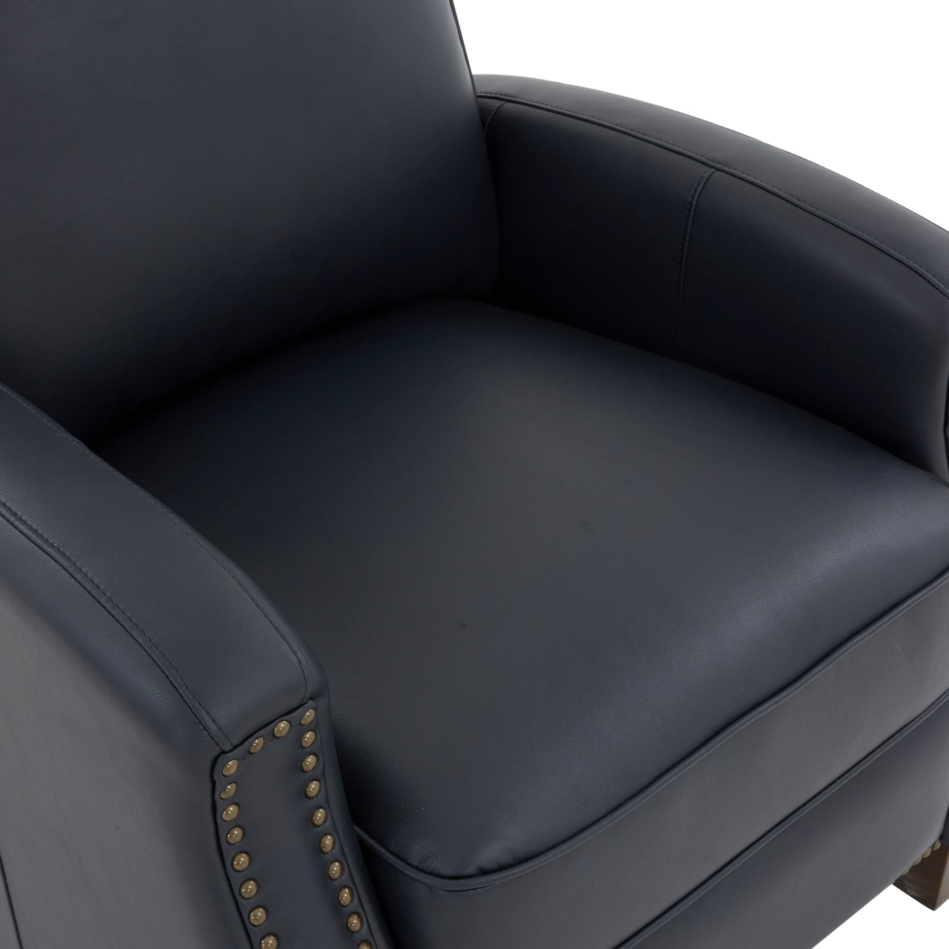 Dark navy upholstered armchair with decorative brass nailhead trim