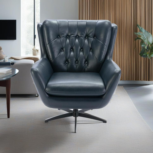 Tufted deep blue leather accent chair with a swivel base perfect for modern living spaces