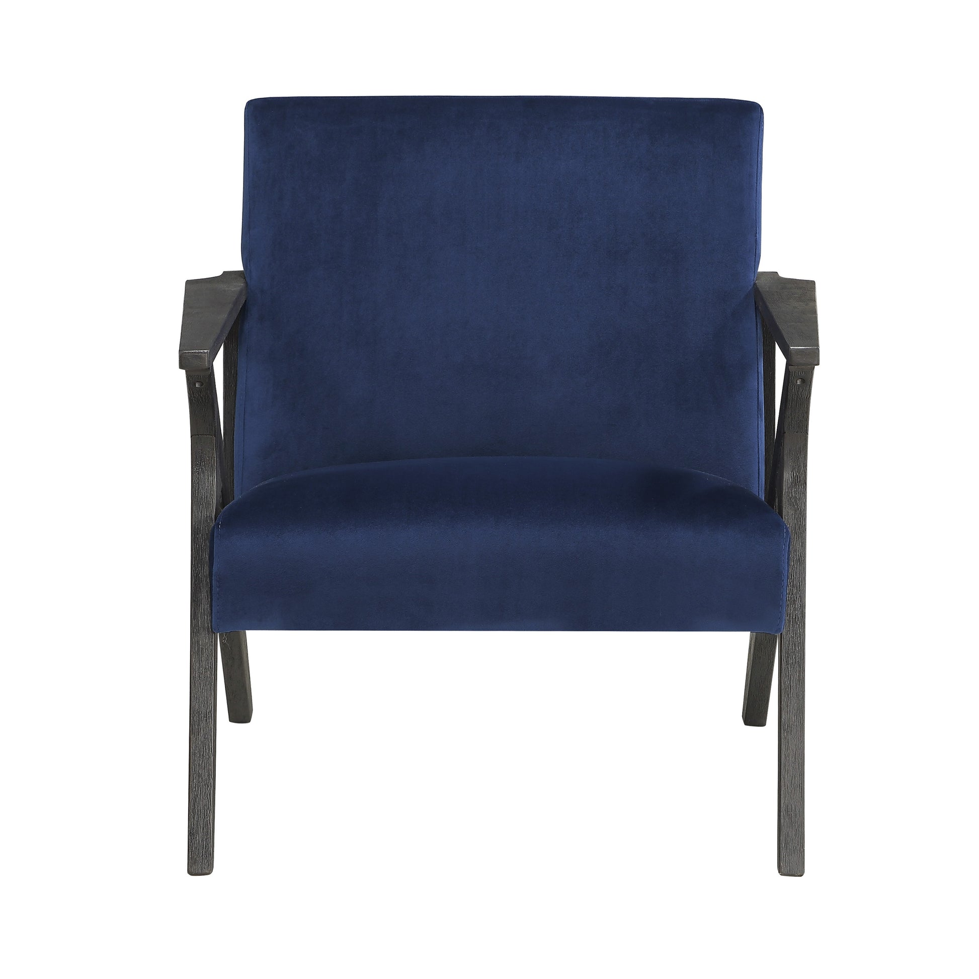 A plush velvet armchair in deep navy blue with dark slender wooden arms and legs
