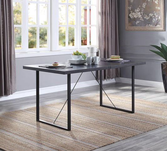 Dark wood veneer dining table with black metal legs set for a meal