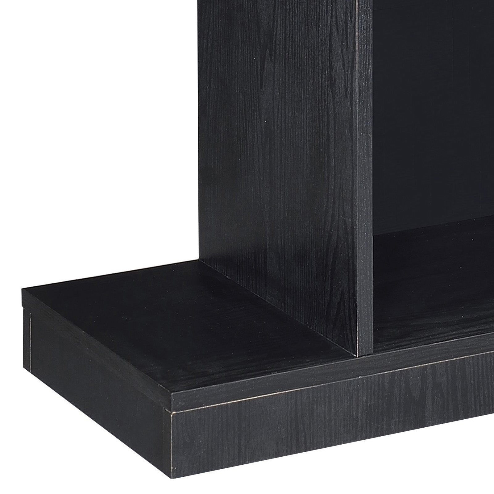 Closeup of black wood veneer on a modern shelving unit base