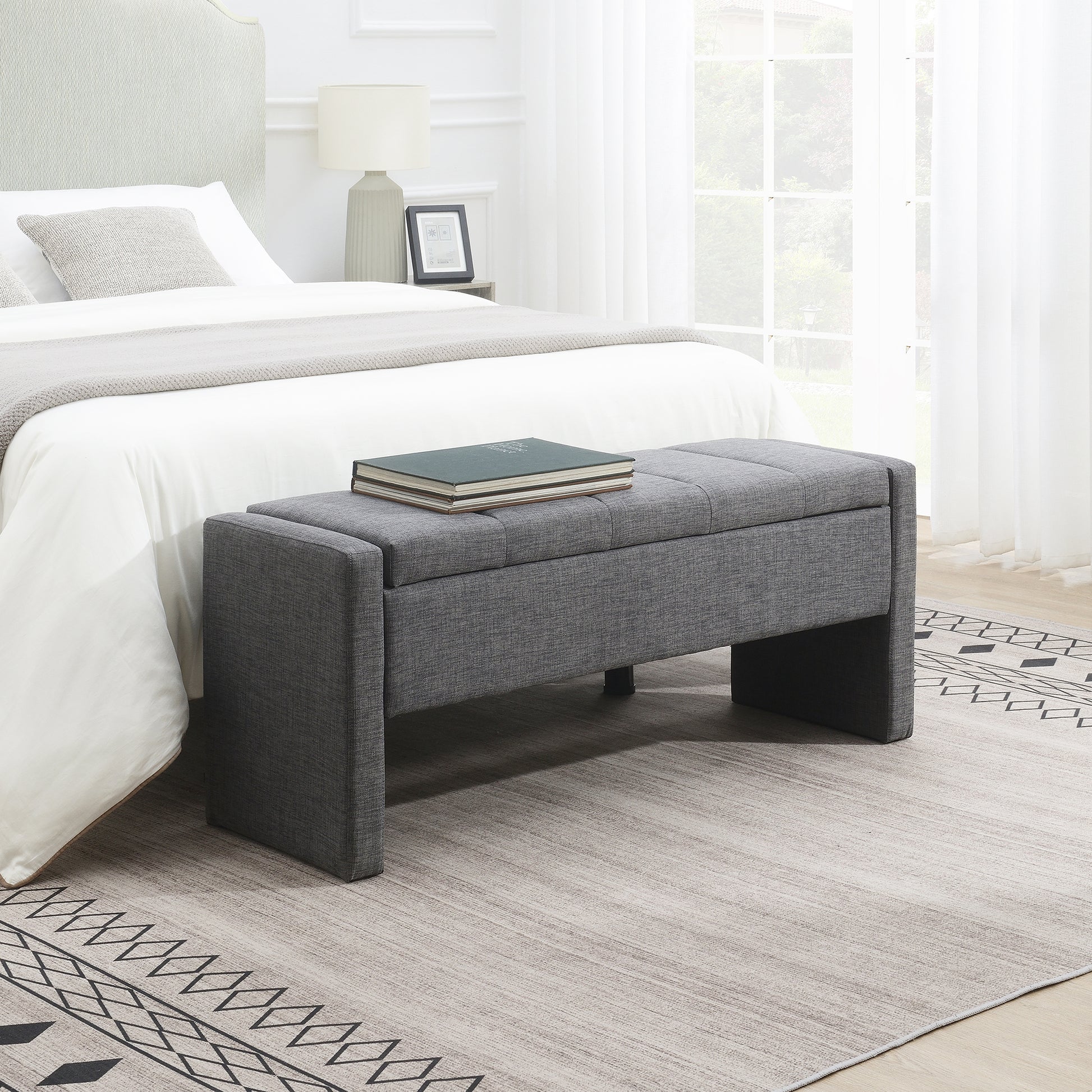 Tufted grey fabric storage bench with modern design