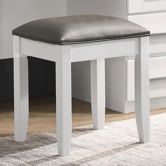 White vanity stool with a dark gray upholstered seat perfect for a dressing table setup
