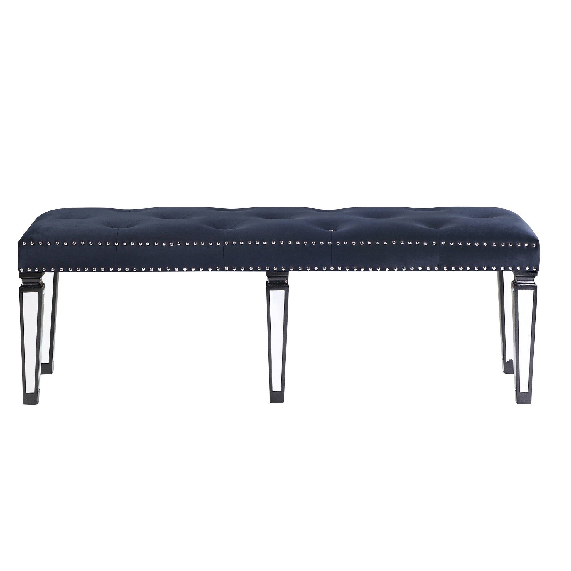 Dark blue velvet tufted bench with silver nailhead trim and modern legs