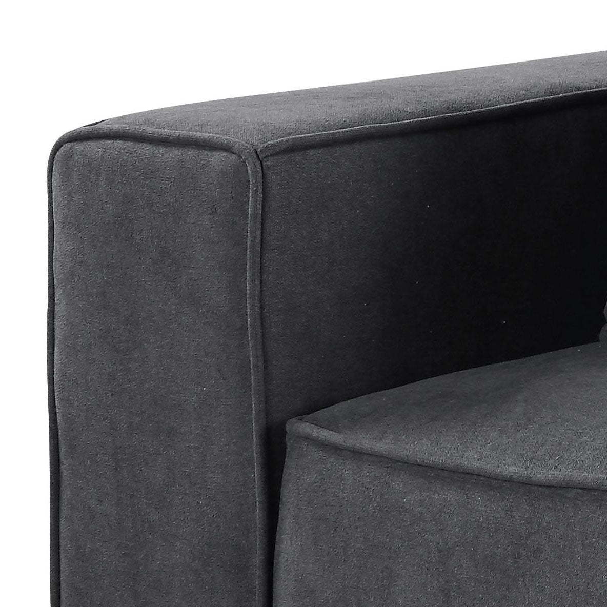Dark gray fabric sofa armrest with piped detailing modern living room furniture