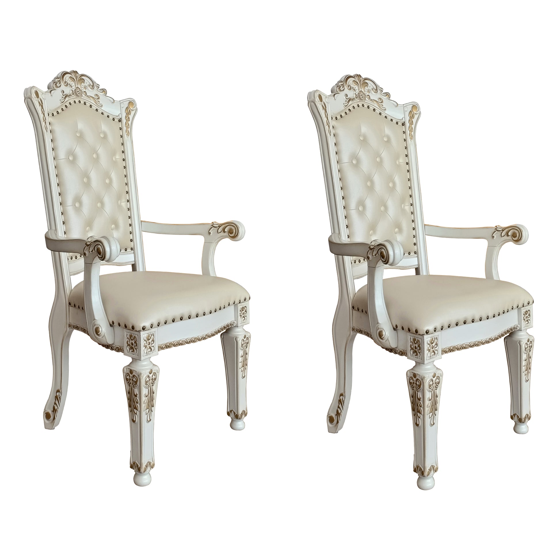 Ornate white tufted armchair with gold accents perfect for dining rooms