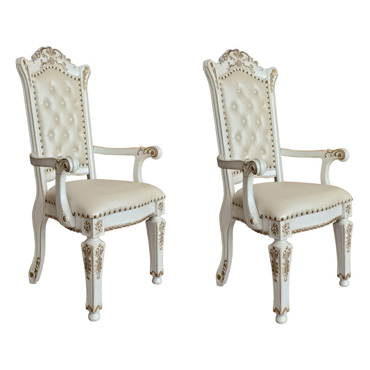 Ornate white tufted armchair with gold accents perfect for dining rooms