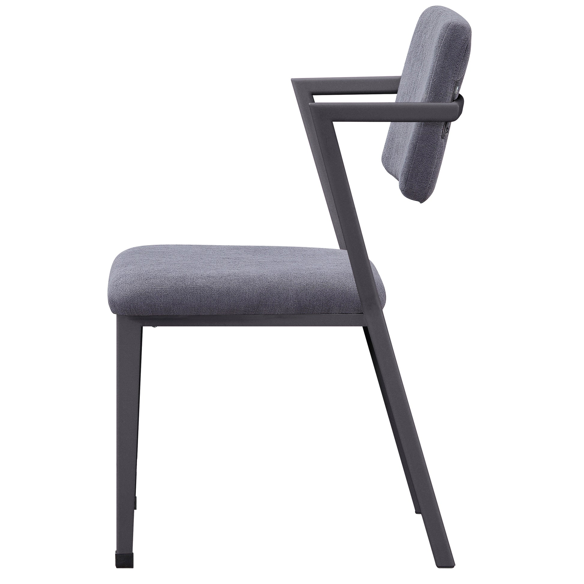 Side view of a modern grey upholstered dining chair with dark metal frame