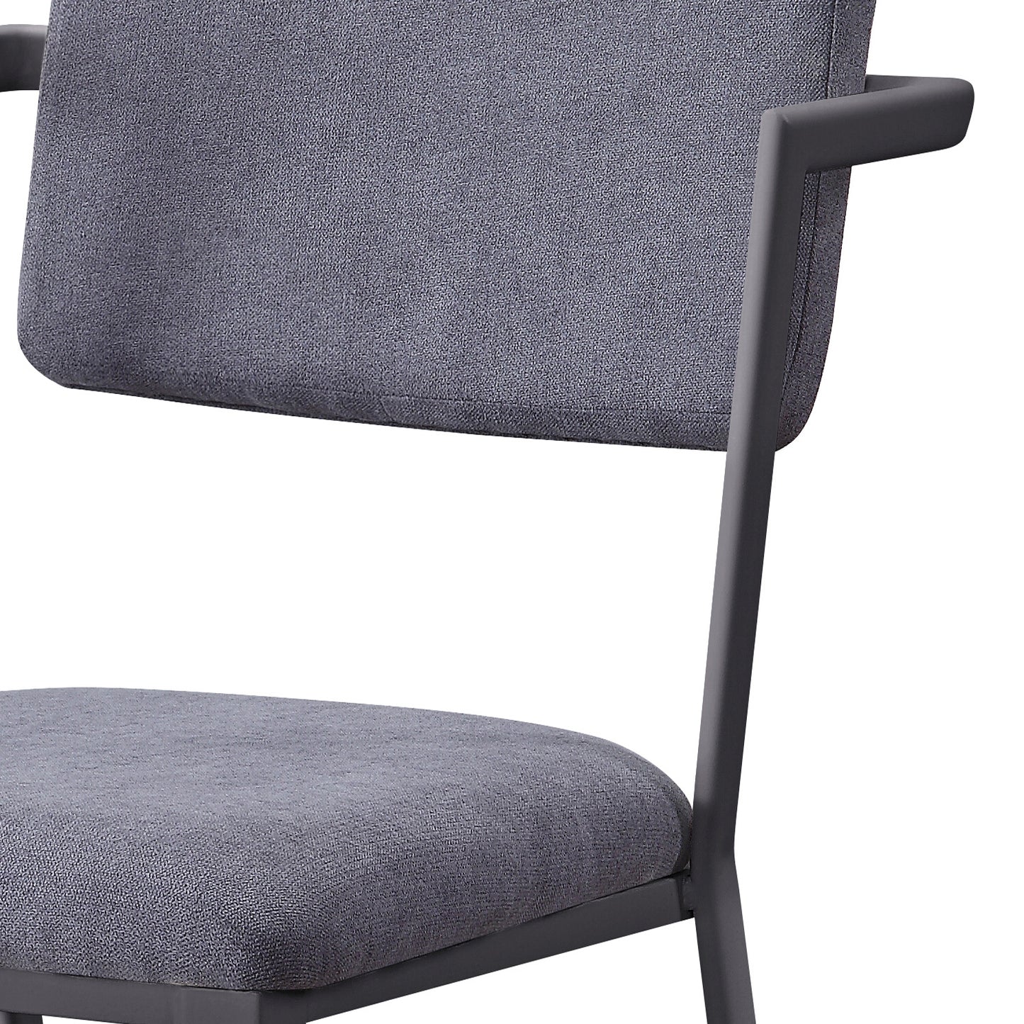 Closeup of a gray upholstered dining chair with metal frame