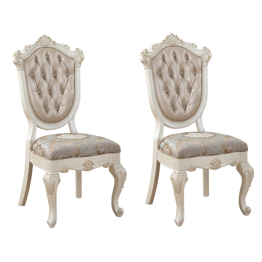 Elegant tufted champagne dining chair with ornate carved legs and floral seat