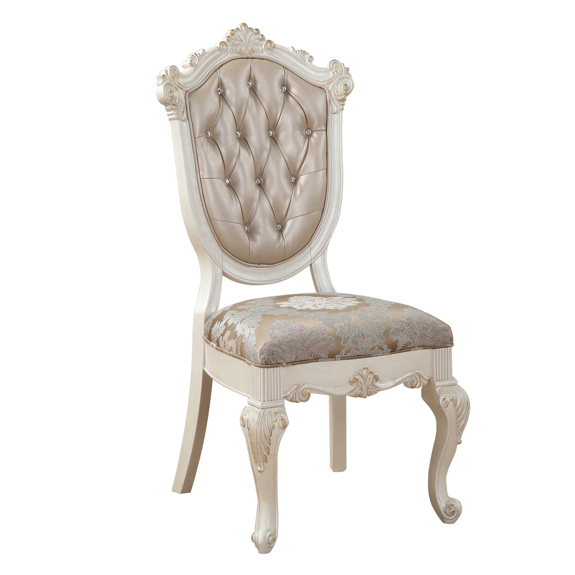 Elegant tufted champagne upholstered accent chair with ornate carved wood frame