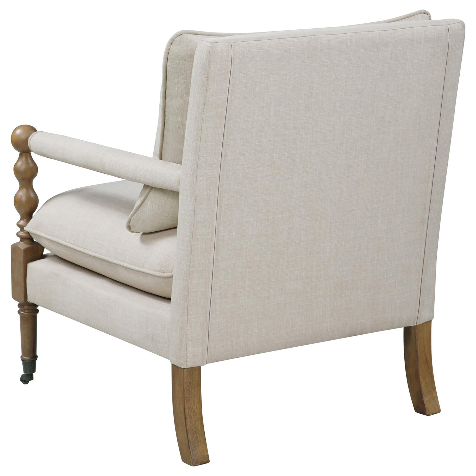 Back view of a beige upholstered armchair with turned wooden armrest and casters