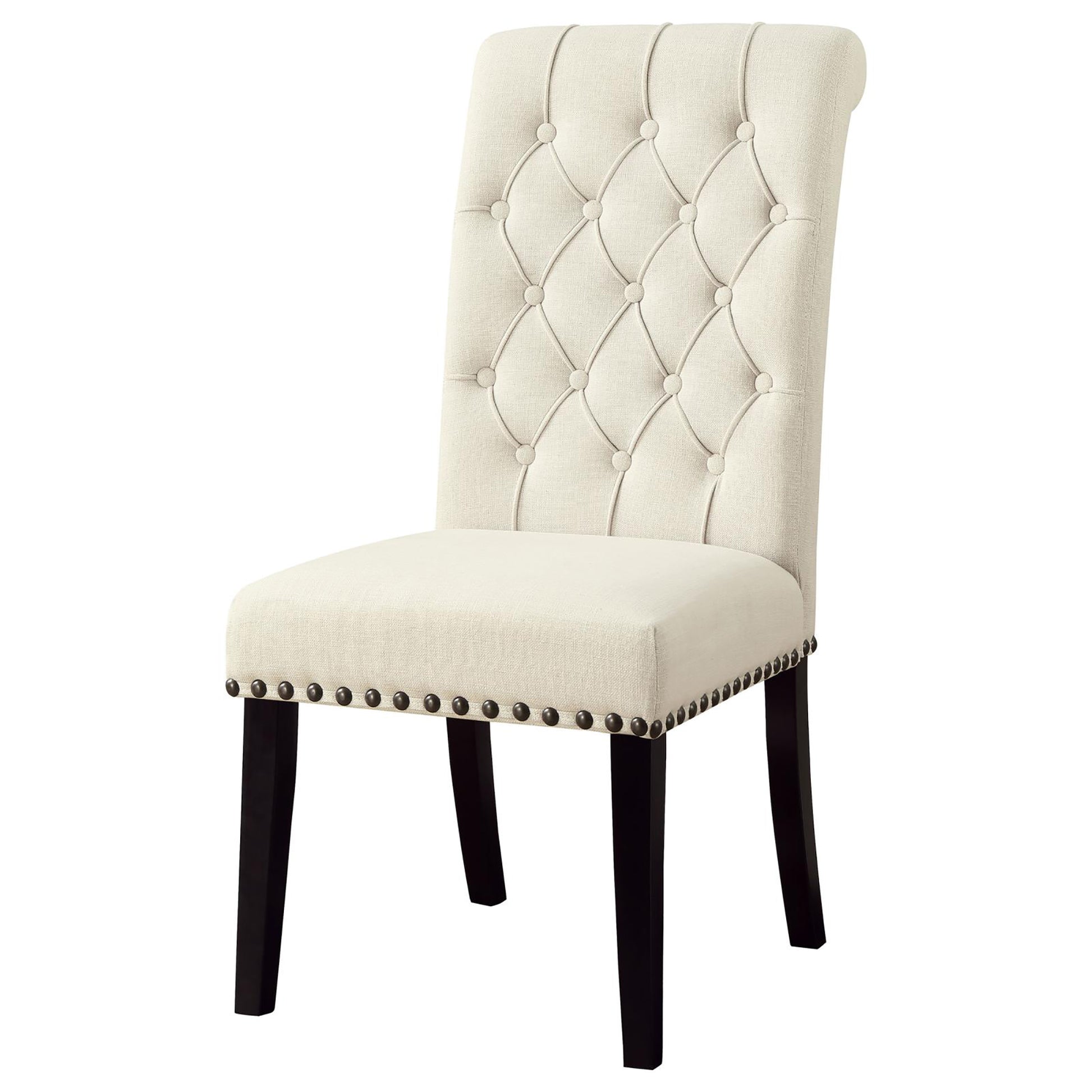 Tufted cream fabric dining chair with dark wood legs and nailhead trim