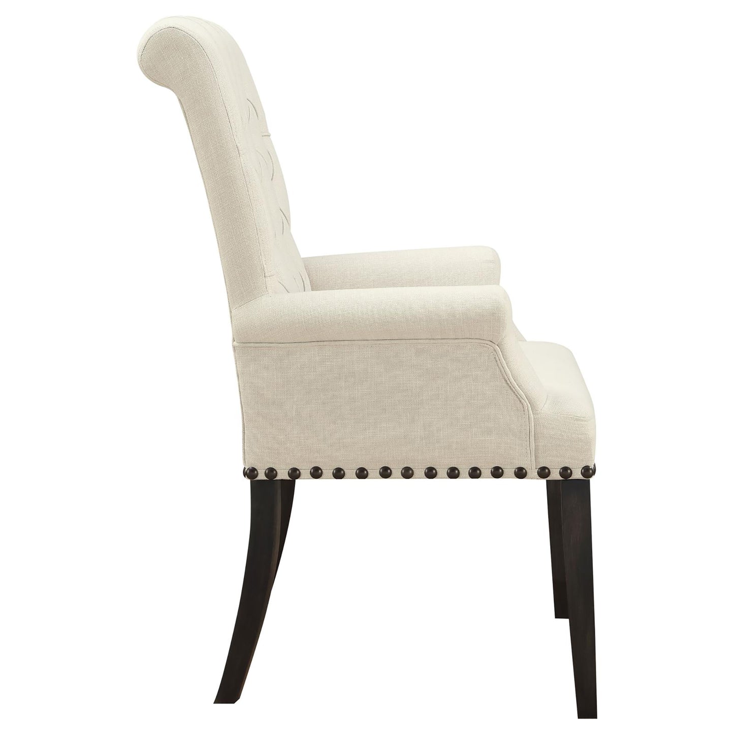 Elegant cream fabric armchair with tufted back and dark wood legs