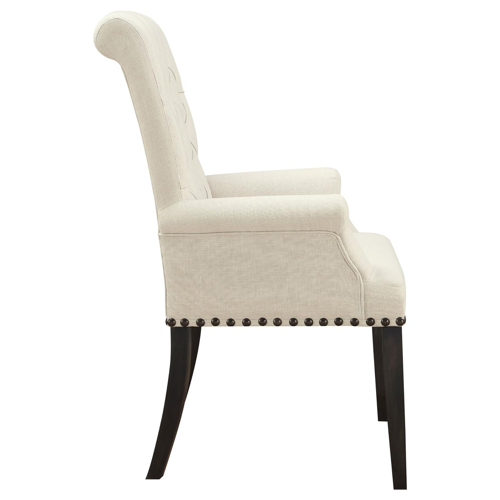 Elegant cream fabric armchair with tufted back and dark wood legs