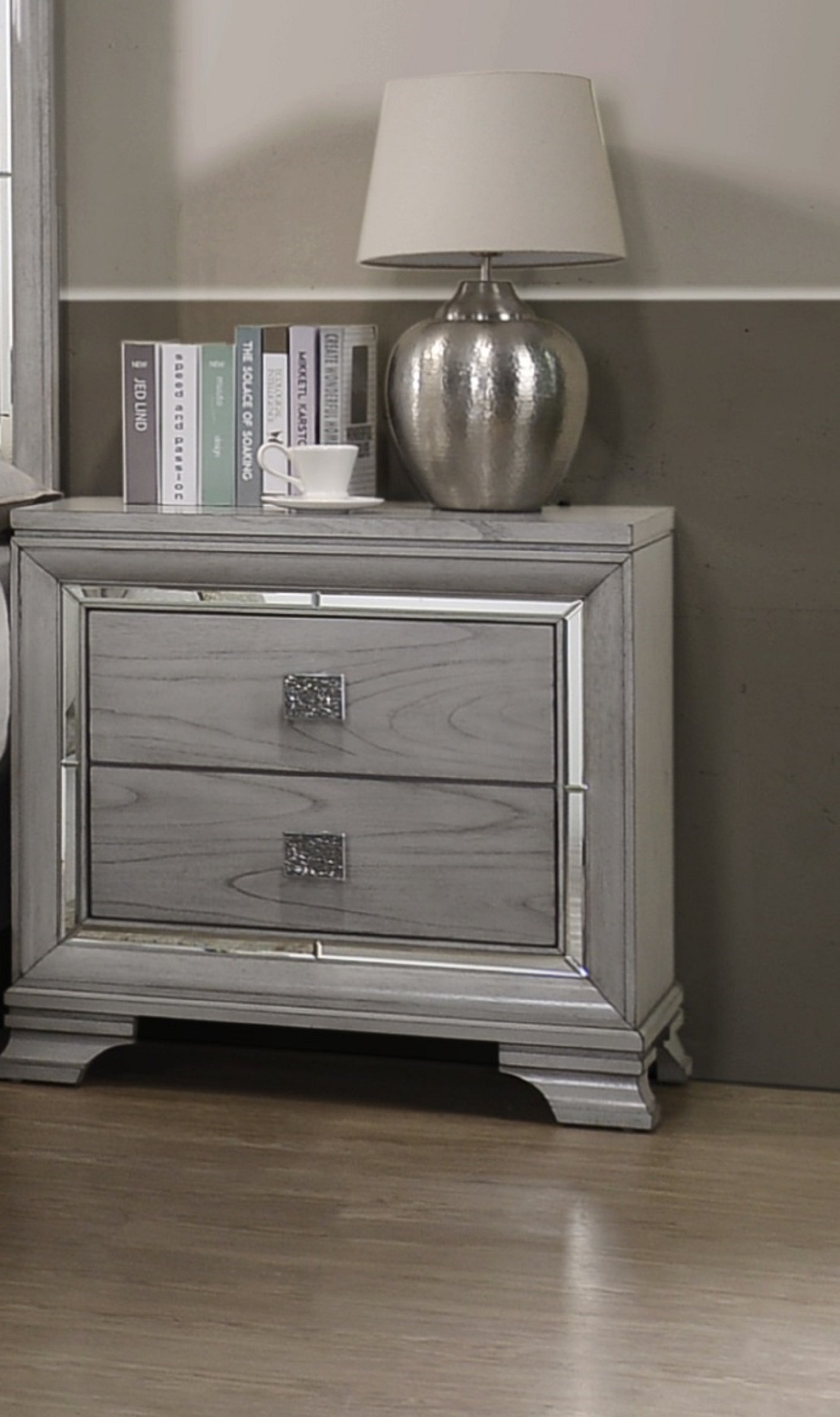 Gray wood bedside table with mirrored accents and crystal drawer pulls