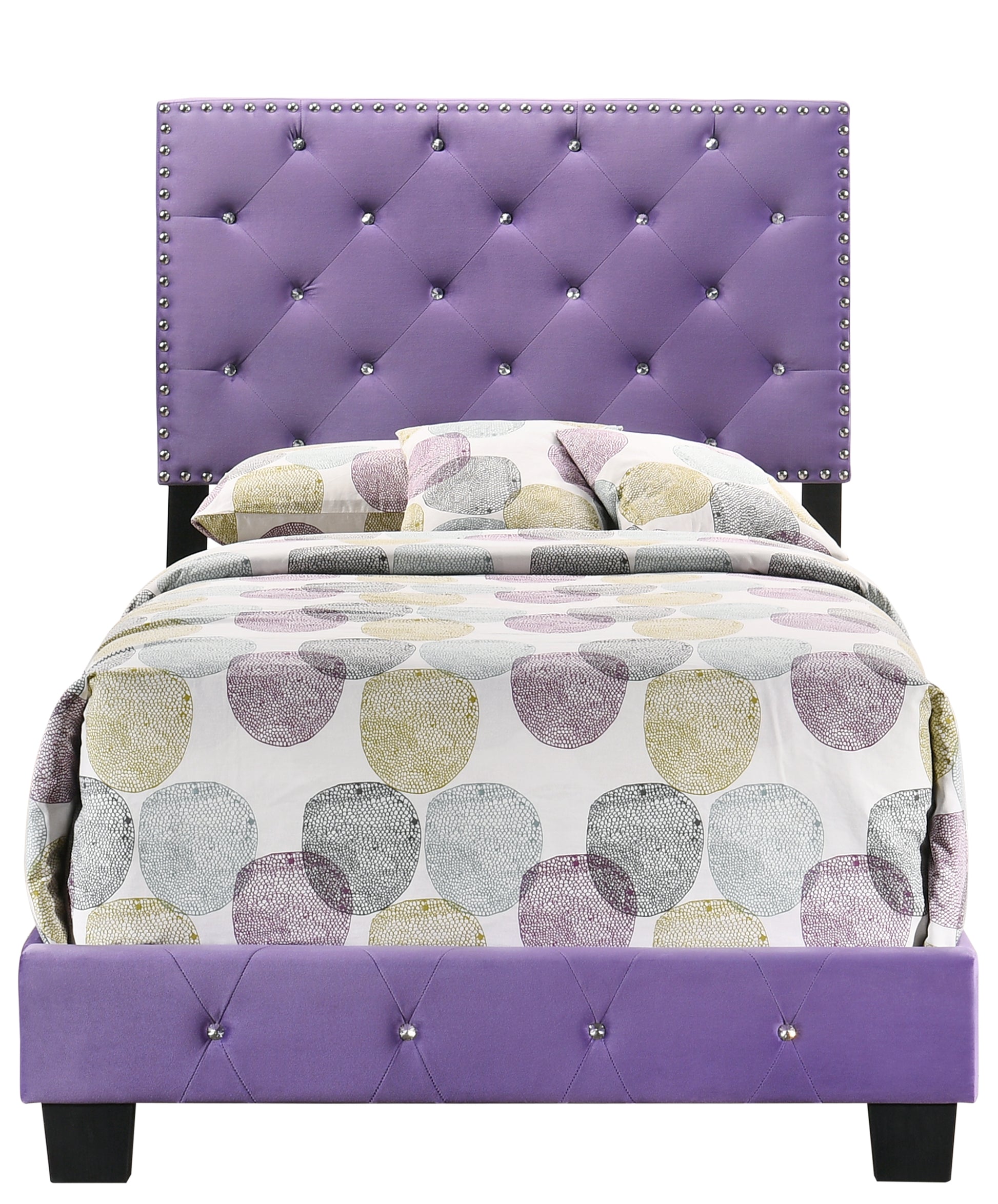 Tufted purple velvet bed frame with crystal accents and patterned bedding