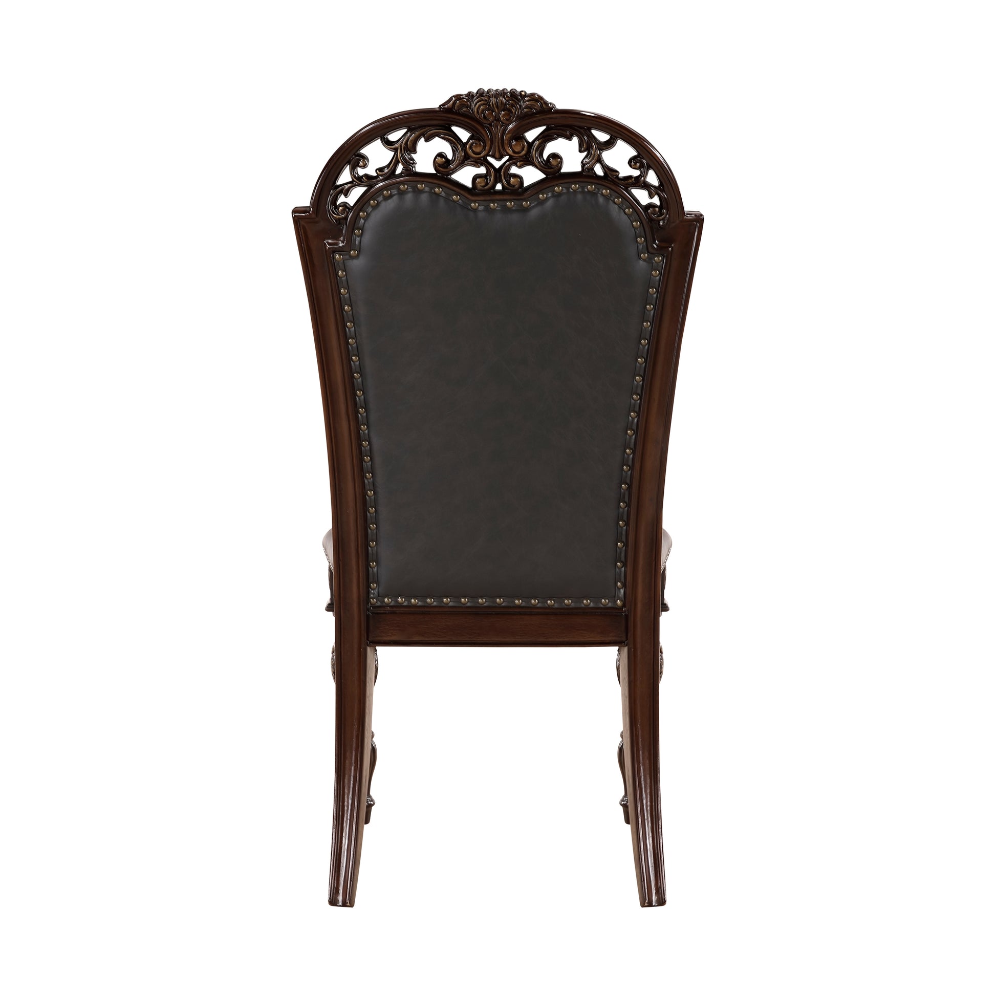 Ornate dark brown wooden chair with upholstered dark leather seat and studded trim