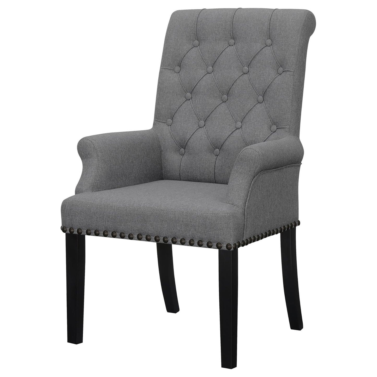 Grey upholstered dining chair with tufted back and nailhead trim