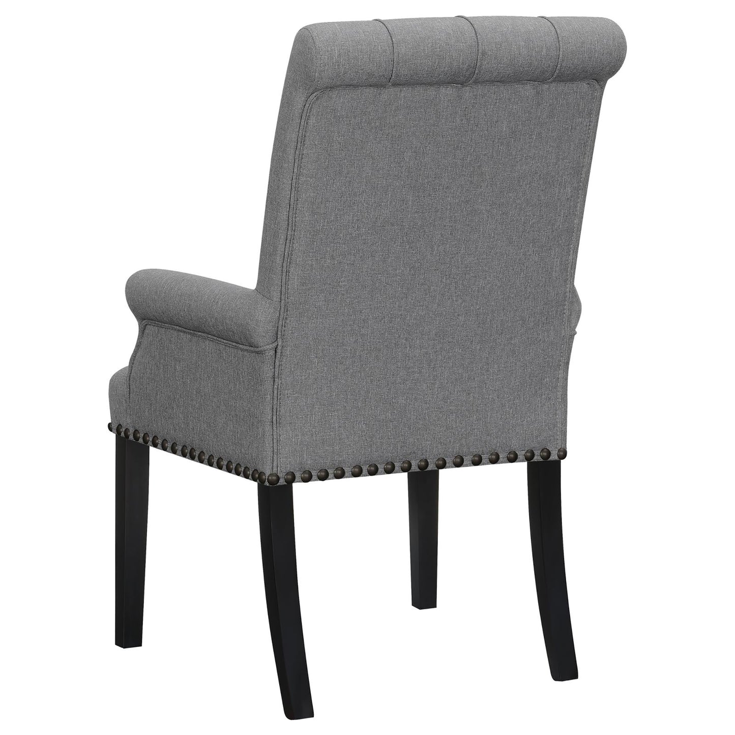 Tufted back grey fabric dining chair with nailhead trim and dark wood legs