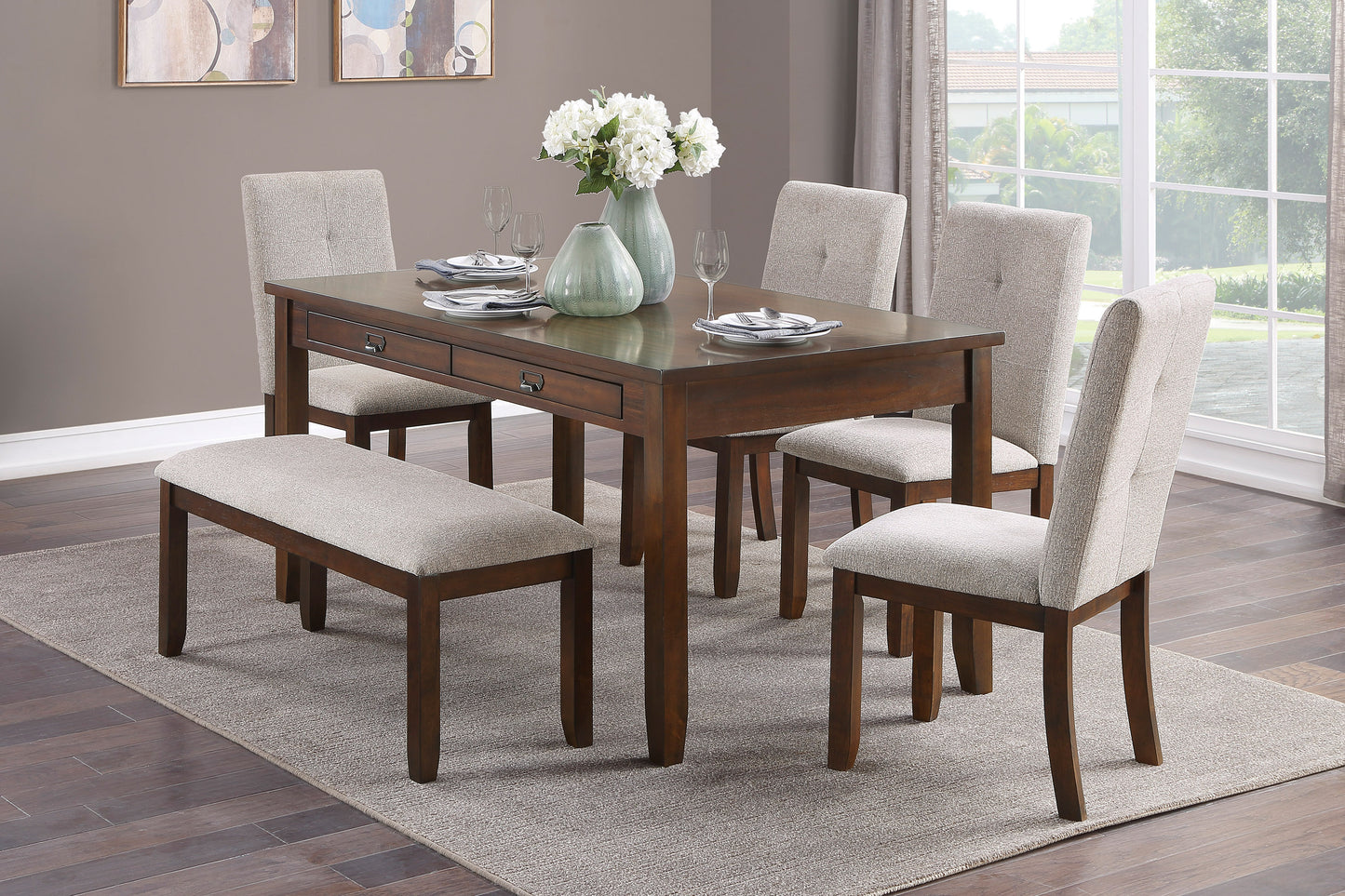 Wooden dining table set with four upholstered chairs and one bench in neutral tones