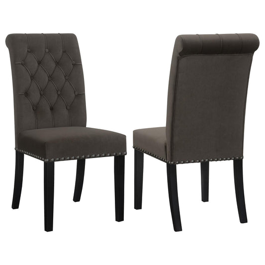 Charcoal velvet dining chair with diamond tufting and nailhead trim perfect for elegant interiors