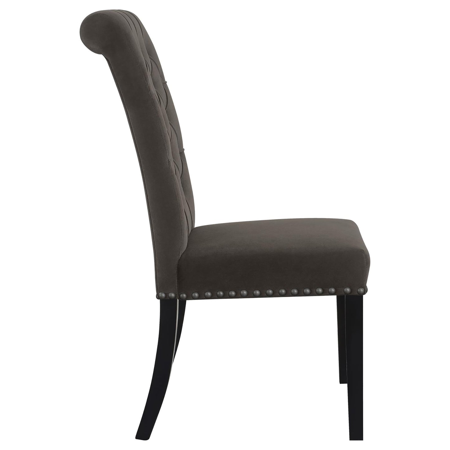 Dark gray tufted velvet dining chair with silver nailhead trim and dark wood legs