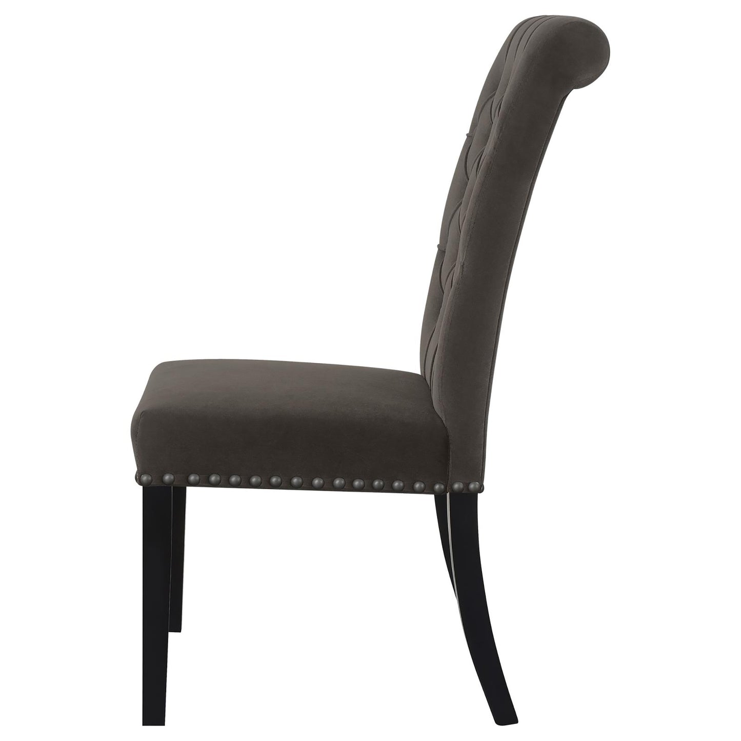 Dark gray velvet dining chair with tufted back and silver nailhead trim