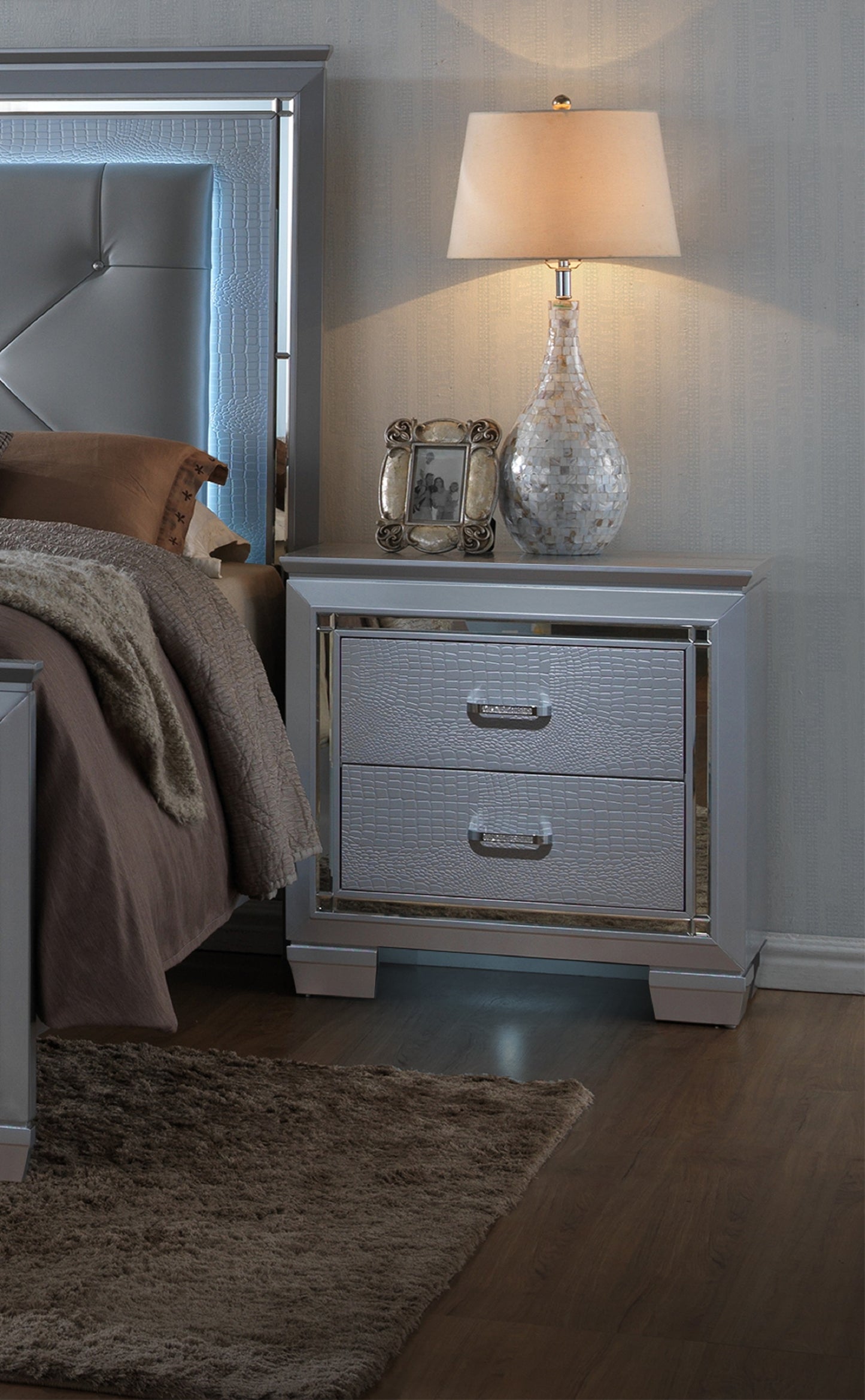 Silver crocodileembossed nightstand with mirrored trim and crystal drawer pulls