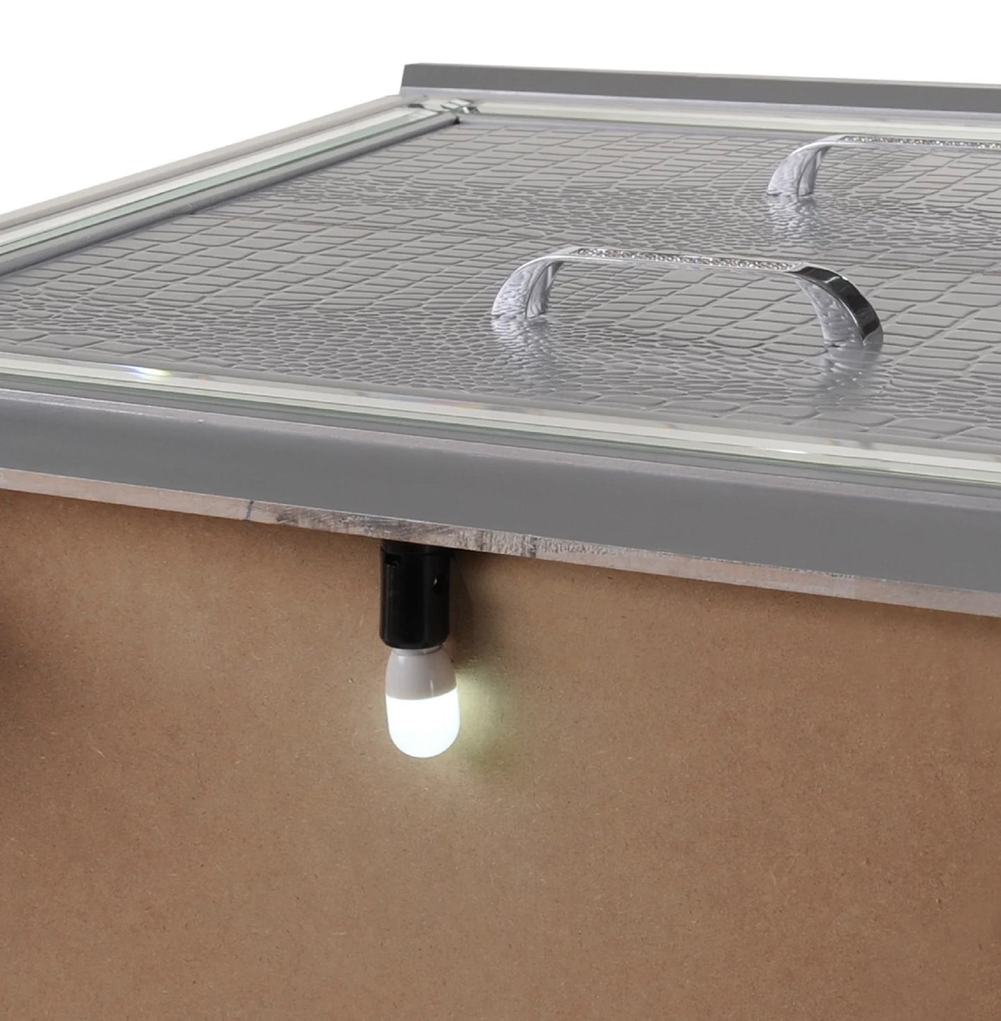 Gray textured lid with chrome handles part of a stylish storage chest  characters