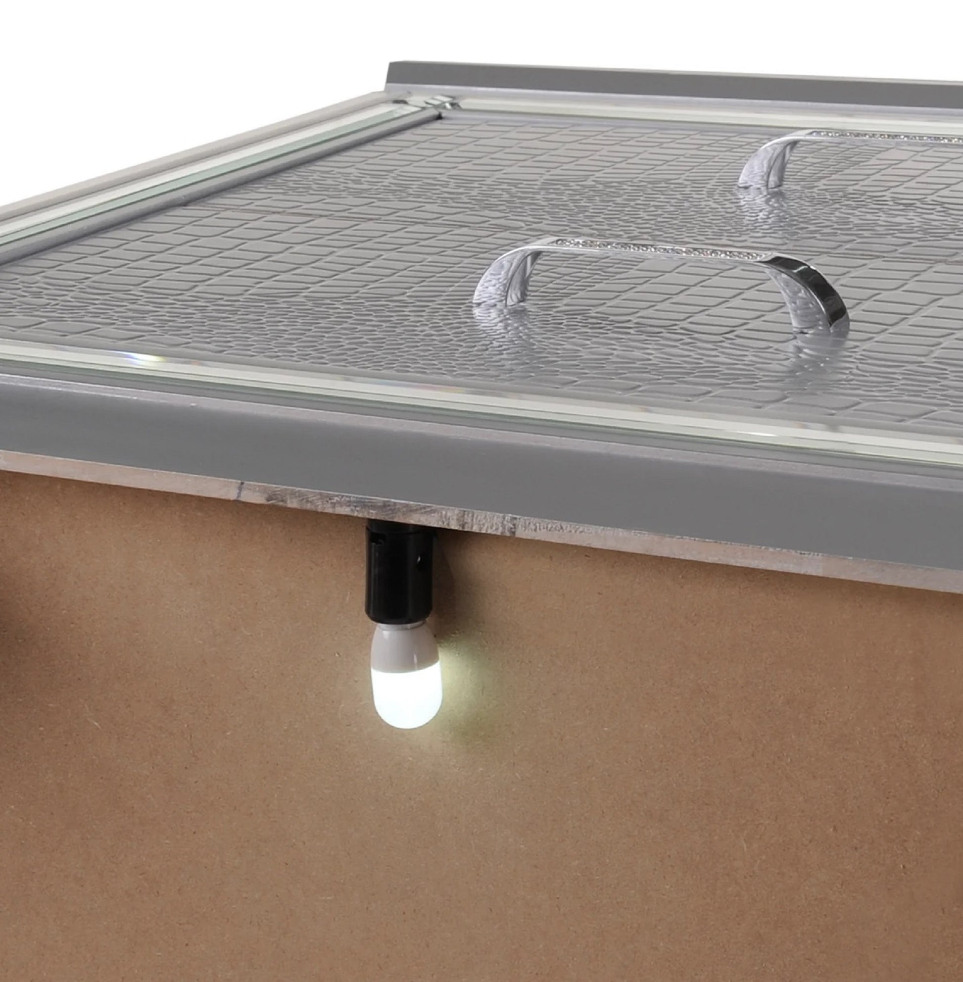 Gray textured lid with chrome handles part of a stylish storage chest  characters