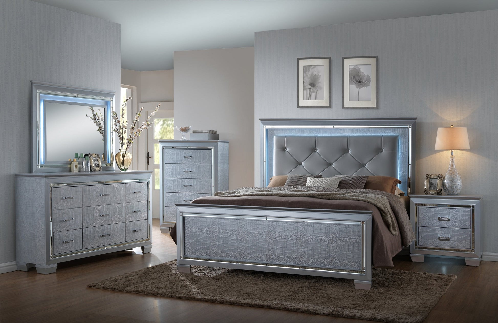 Grey upholstered queen bed with diamond tufting and LED headboard