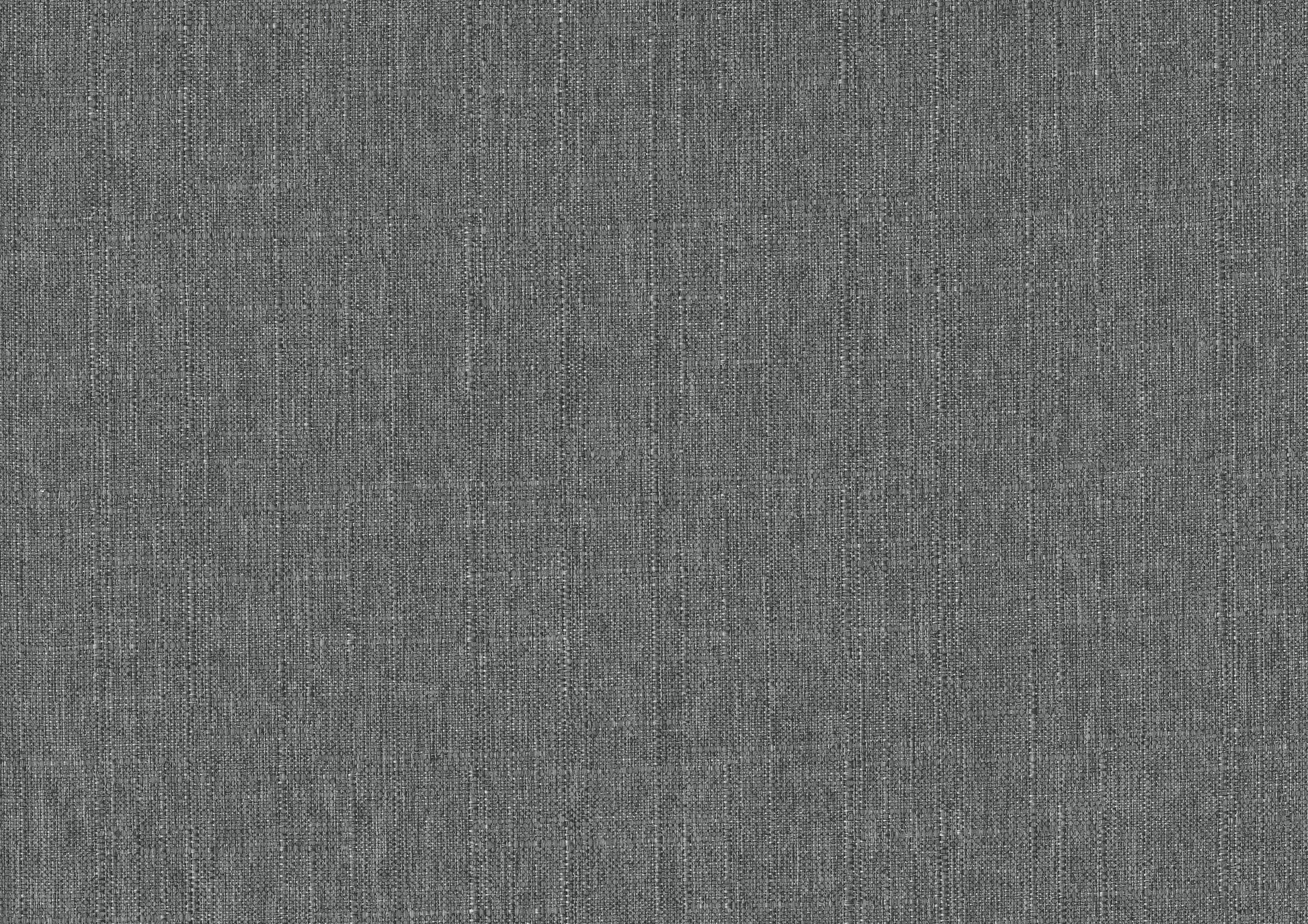 Closeup of dark gray textured upholstery fabric ideal for modern furniture