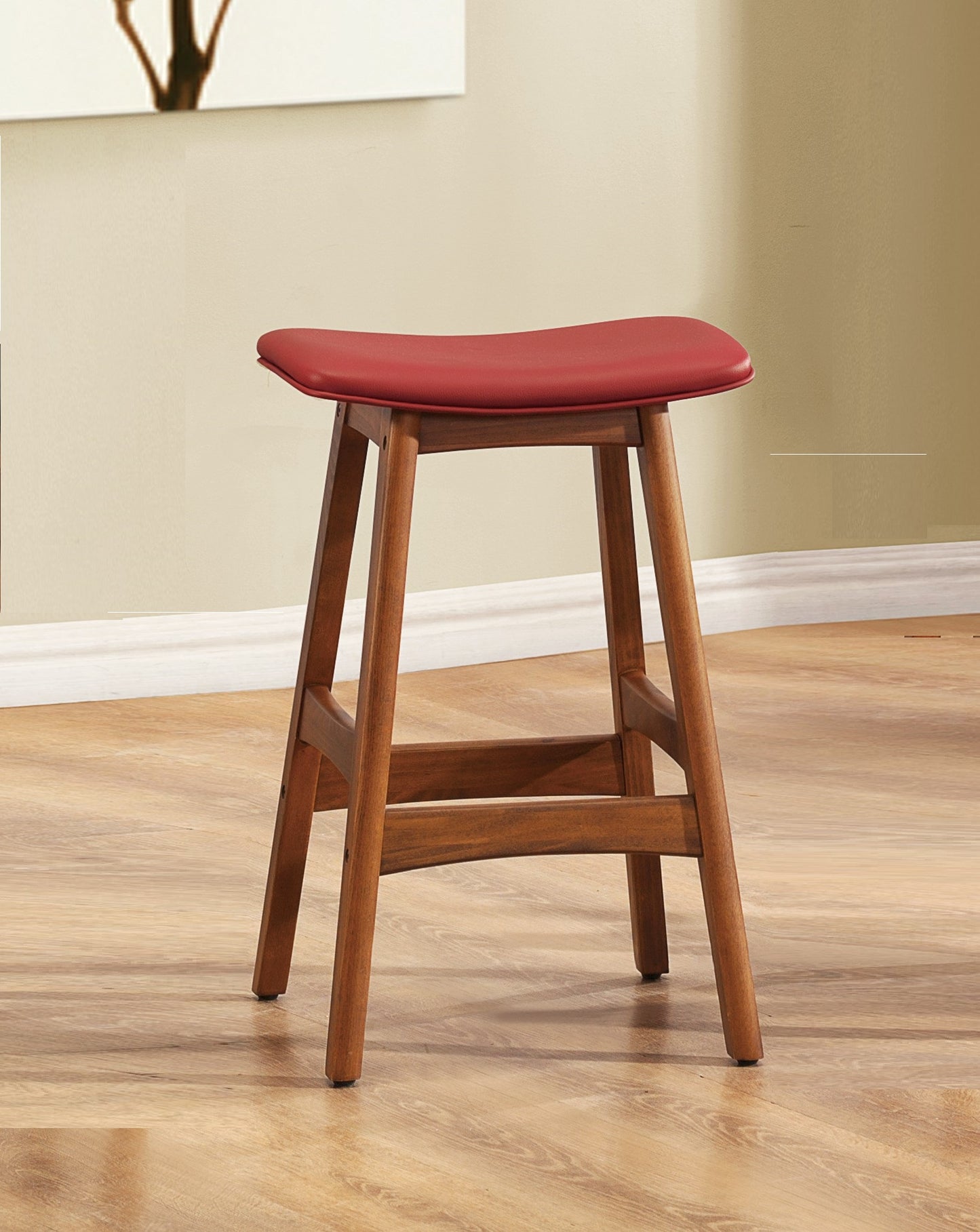 Red leather saddle stool with walnut finish wooden legs perfect for kitchen island