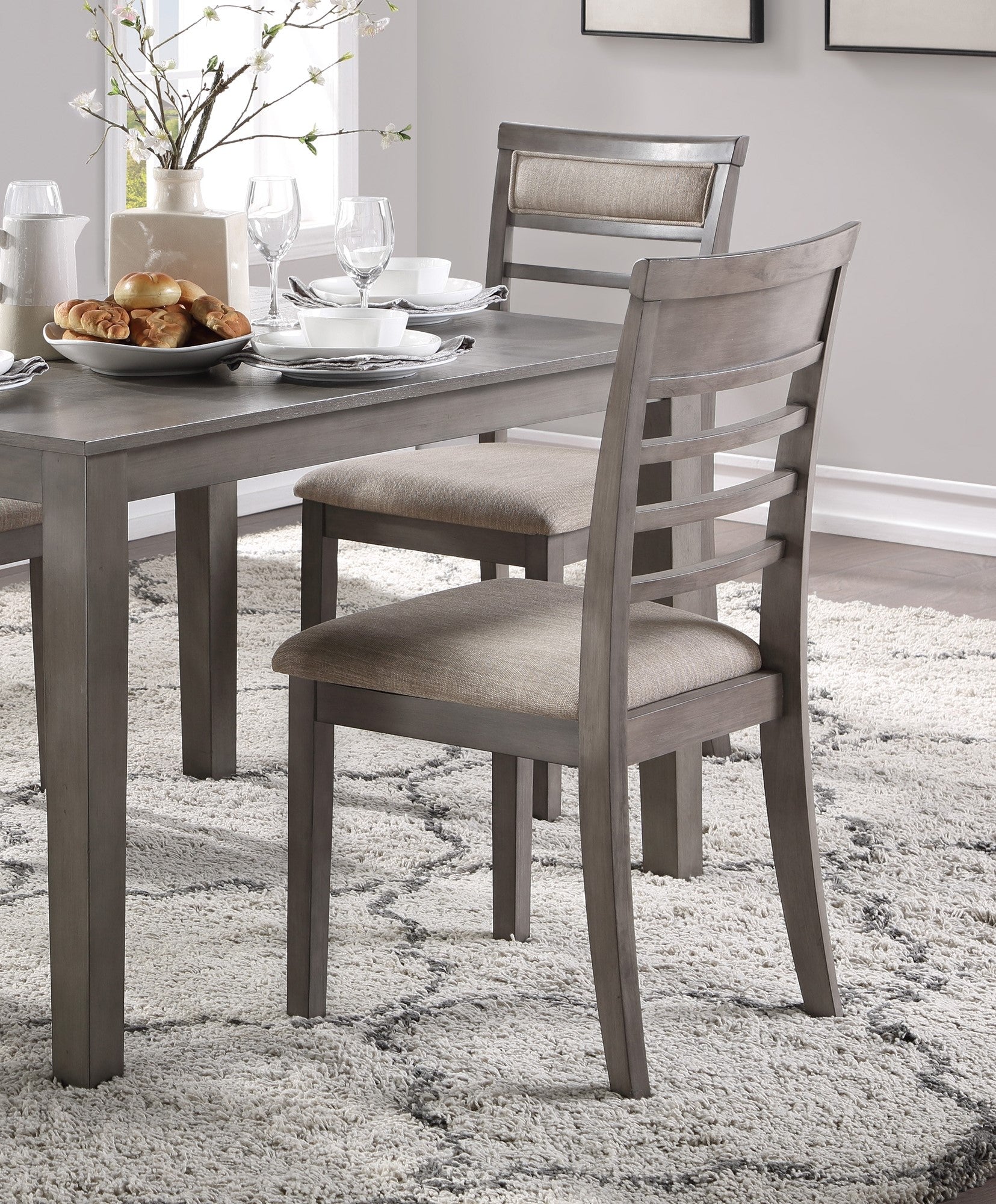 Gray wooden dining chair with upholstered seat and backrest perfect for modern homes