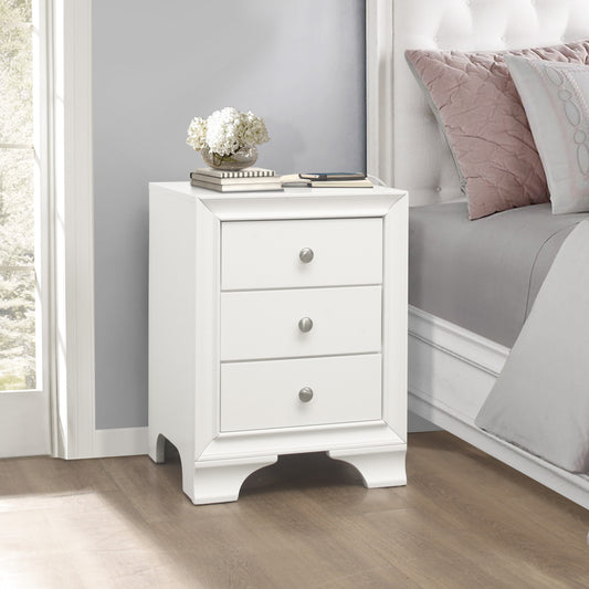 White threedrawer nightstand with silver knobs and decorative top molding