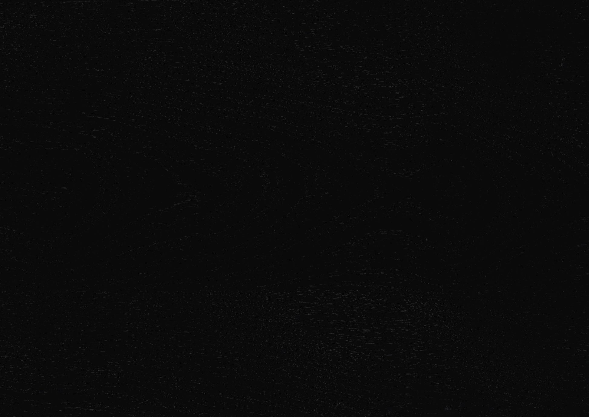 Textured black leather swatch for upholstery or fashion accessories
