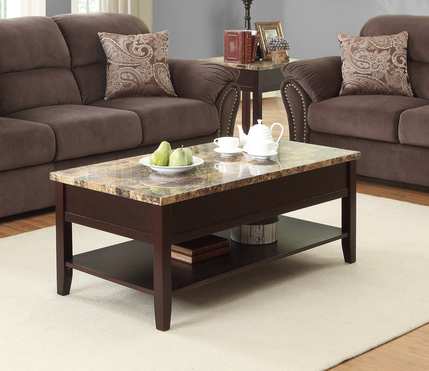 Dark wood coffee table with faux marble top and lower shelf for storage