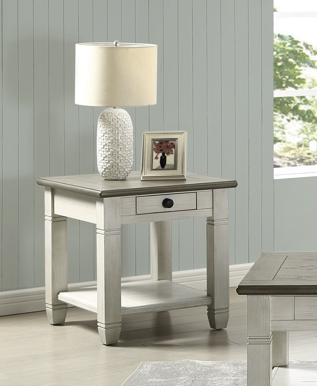 White distressed wood end table with a single drawer and lower shelf perfect for living rooms