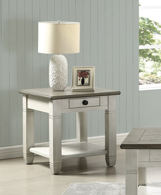 White distressed wood end table with a single drawer and lower shelf perfect for living rooms