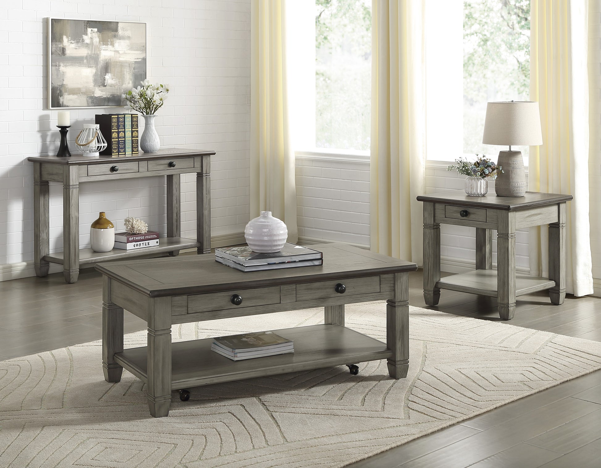 Distressed grey wood coffee table with two drawers and a lower shelf