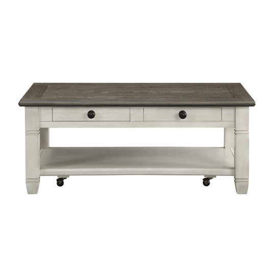 Farmhouse coffee table with distressed white finish wood top two drawers and casters