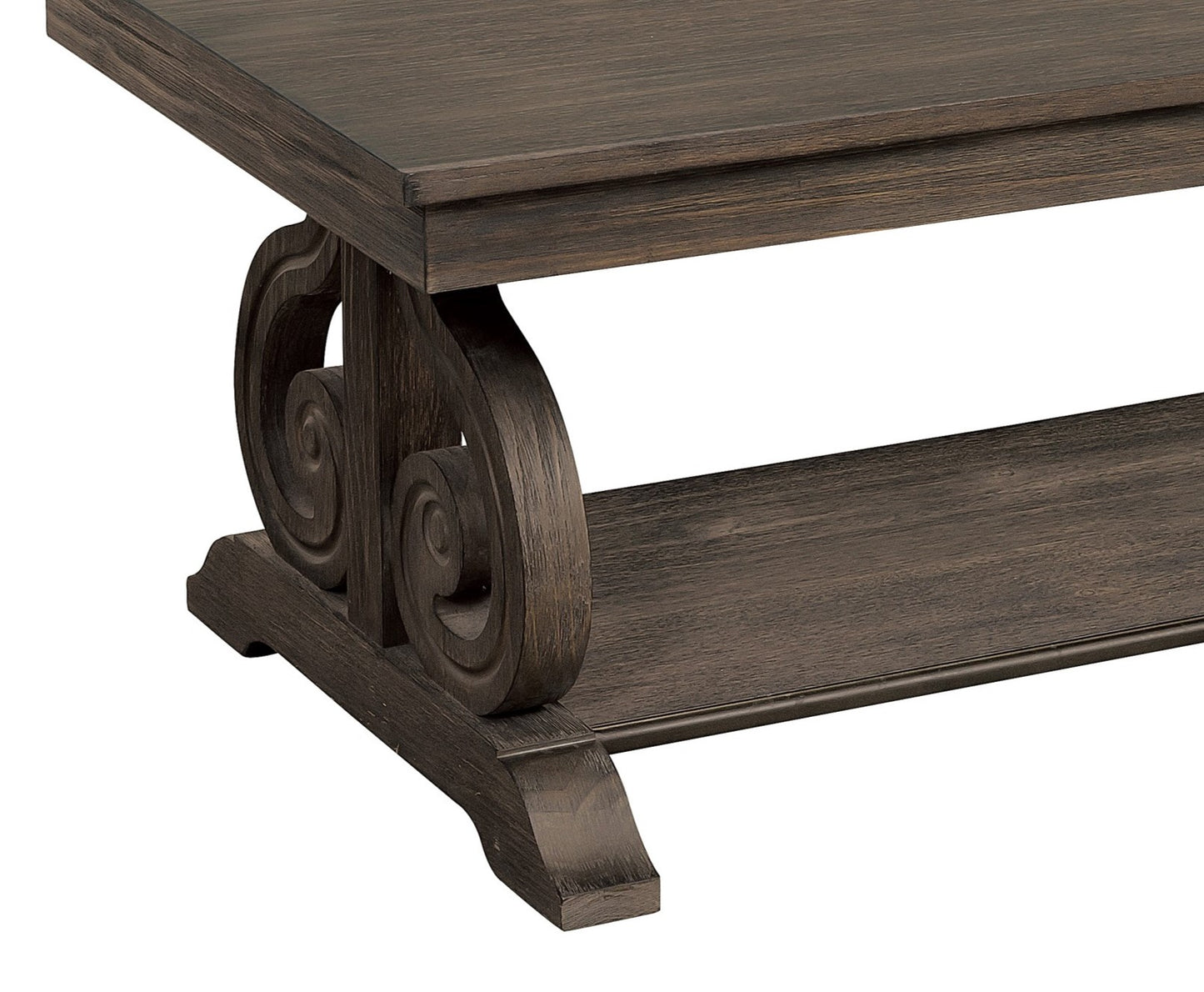 Dark oak coffee table with carved scroll legs and lower shelf