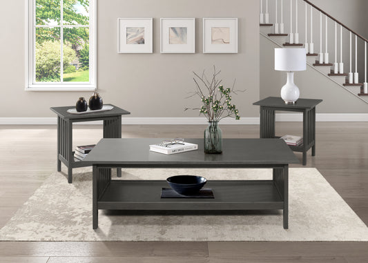 Gray missionstyle coffee table with lower shelf holding books and a decorative bowl