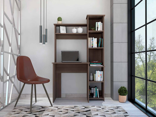 Modern walnut desk with integrated shelving unit holding a laptop and books