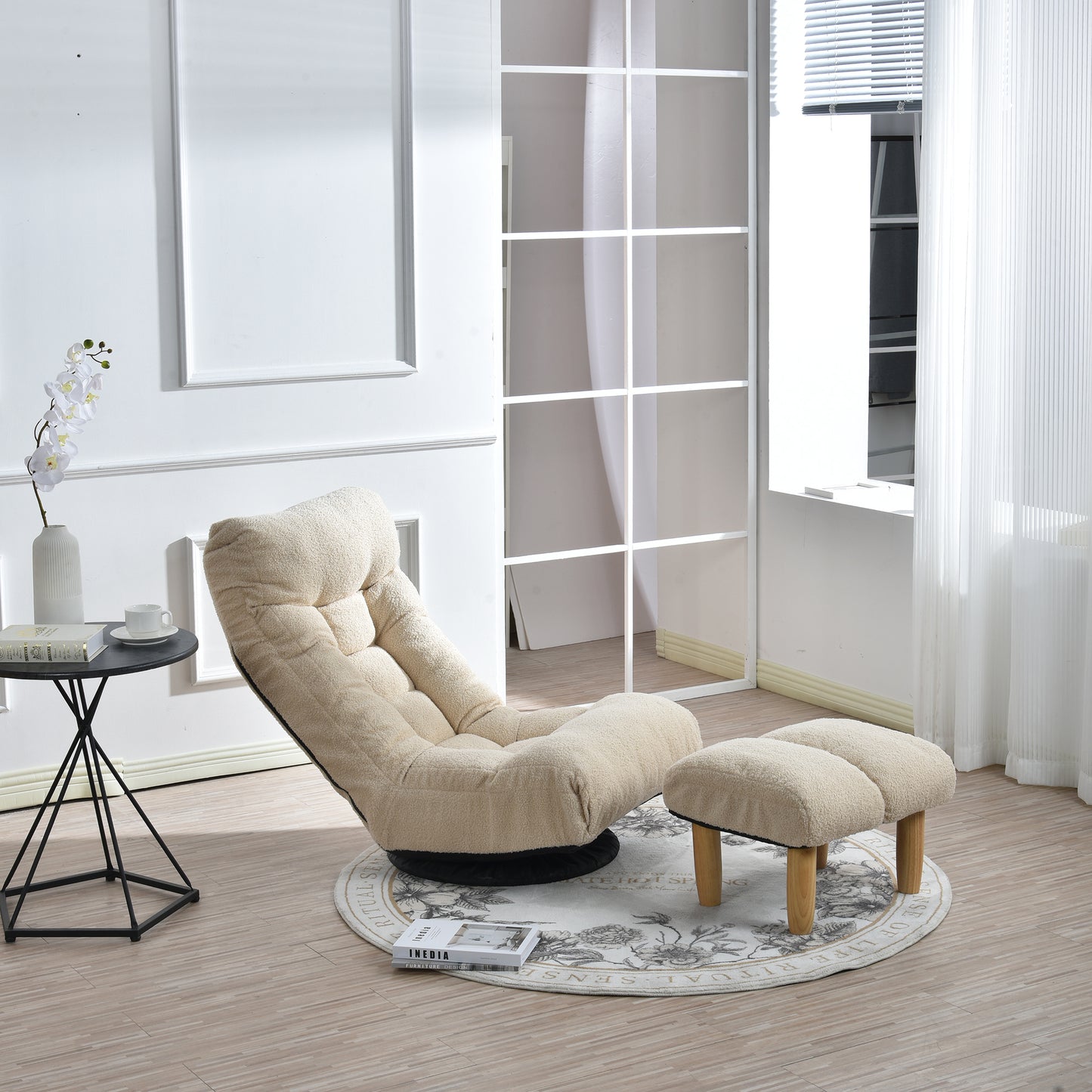 Cream boucle floor chair with adjustable backrest and matching ottoman for comfortable lounging